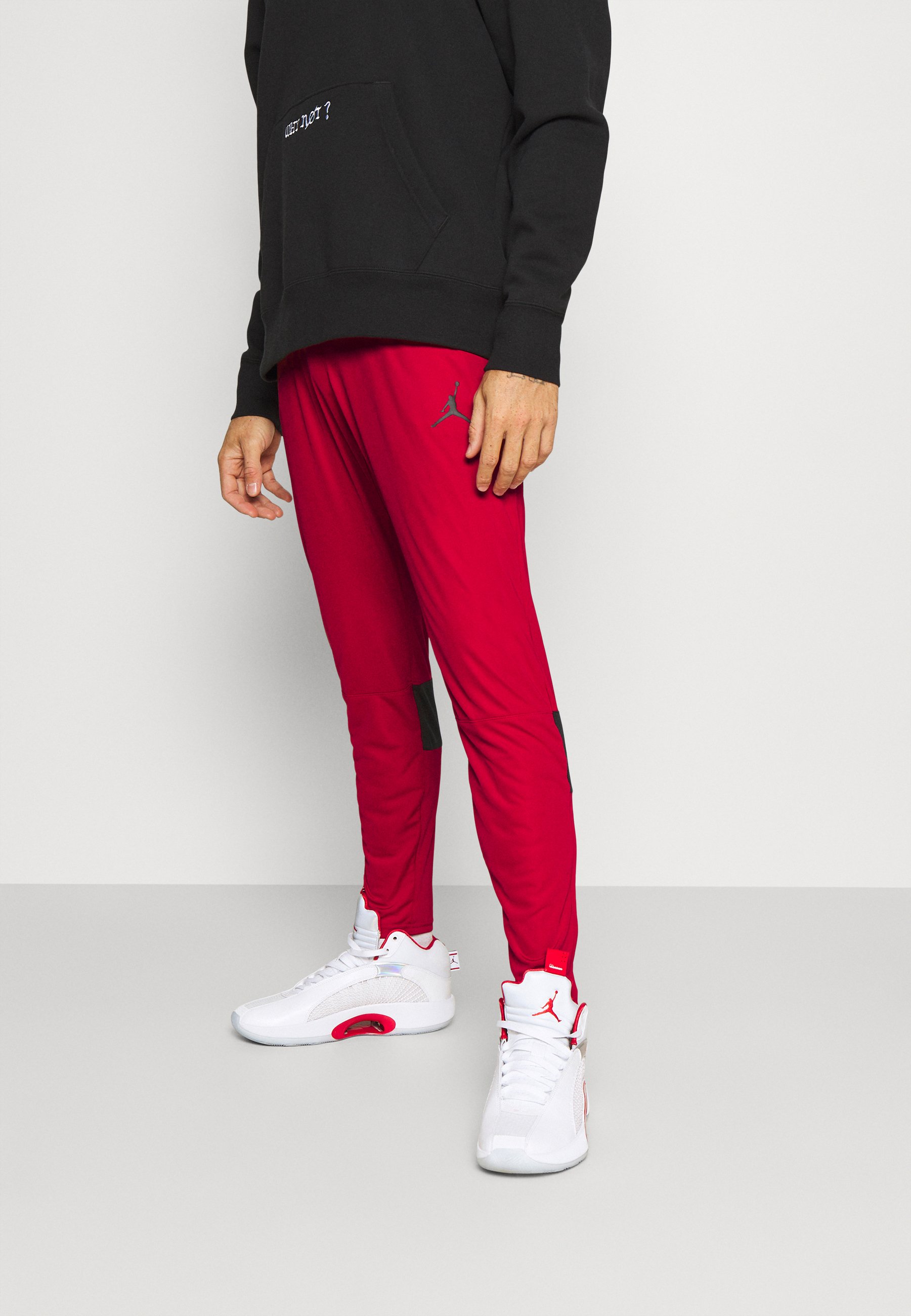 Jordan AIR PANT - Pantalones deportivos - gym red/black/rojo - Zalando.es