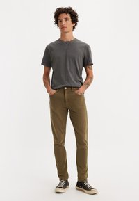 Levi's® 512™ SLIM TAPER - Slim fit jeans - forest foliage gd