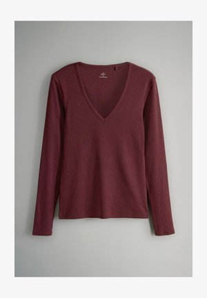 Bordeaux lange mouwen top met een diepe V-hals, gemaakt van ribbelstof, met zijslits aan de zoom voor extra detail en comfort.