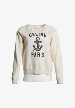 Cremefarbenes Langarm-Sweatshirt mit schwarzer Anker-Grafik und Text "CELINE PARIS" auf der Vorderseite.
