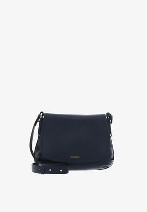 Navy blue leather crossbody bag with flap closure, adjustable strap, and small gold "Coccinelle" logo on front.