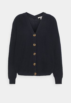 Cardigan en maille bleu marine avec col en V, manches longues, poignets et ourlet côtelés, et cinq boutons marron sur le devant.