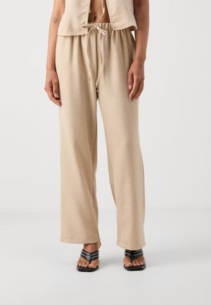 Trousers - beige