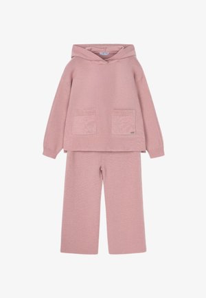 Felpa a maglia rosa chiaro con tasche frontali abbinata a pantaloni a gamba larga in maglia, progettata per un comfort casual.