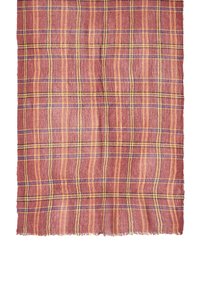 Woven textile with a red and beige plaid pattern, accented by yellow and blue lines. Frayed edges provide a textured finish.