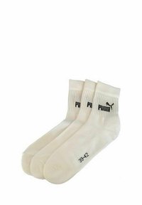 Drei Paar weiße Knöchelsocken mit schwarzem Puma-Logo und der Größe 39-42, die sich überlappend auf einem weißen Hintergrund anordnen.