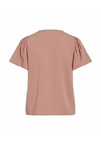 Blusa color rosa con maniche corte a sbuffo e scollatura rotonda, realizzata in tessuto morbido con una vestibilità comoda e senza decorazioni visibili.