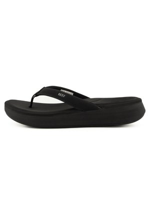 Black flip-flop sandal with a flexible rubber sole and thin straps; the sole features a slight elevation for comfort. Reinforced hardware visible.