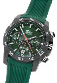 Reloj cronógrafo verde con correa de silicona texturizada, caja de acero inoxidable negro y esfera verde que presenta marcadores de hora en blanco y subesferas.