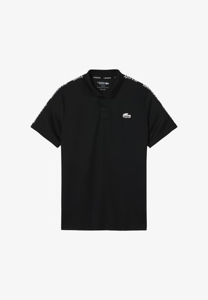 Camisa polo negra de algodón. Presenta un cuello, mangas cortas y un pequeño logotipo blanco en el pecho. Costuras laterales con un detalle estampado.