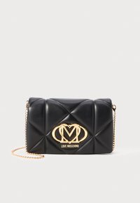 EMBOSSED - Cross body bag - black
