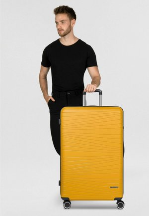 FRANKY, DALLAS 3.0 4 ROLLEN TROLLEY L 75 CM UNISEX - Valise - yellow