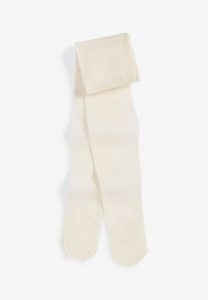 Collants beiges en matériau doux ; présentent une texture lisse avec un léger éclat, finis sans couture avec un bout arrondi.