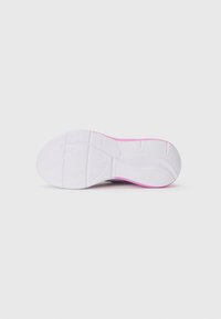 White athletic shoe sole with pink accents, featuring textured grip patterns and a rounded, ergonomic shape. Durable rubber material.