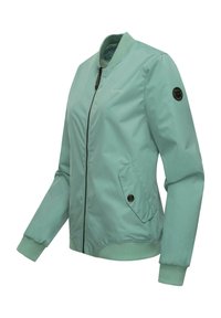 Světlá mátová bomber bunda vyrobená z hladkého materiálu. Má přední zip, žebrované manžety, pas a boční kapsy se cvokovými uzávěry.