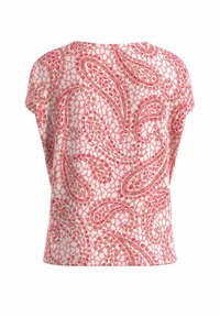 Top à manches courtes en tissu rose et crème, présentant un motif abstrait audacieux avec des formes courbes et une texture subtile. Vue arrière affichée.