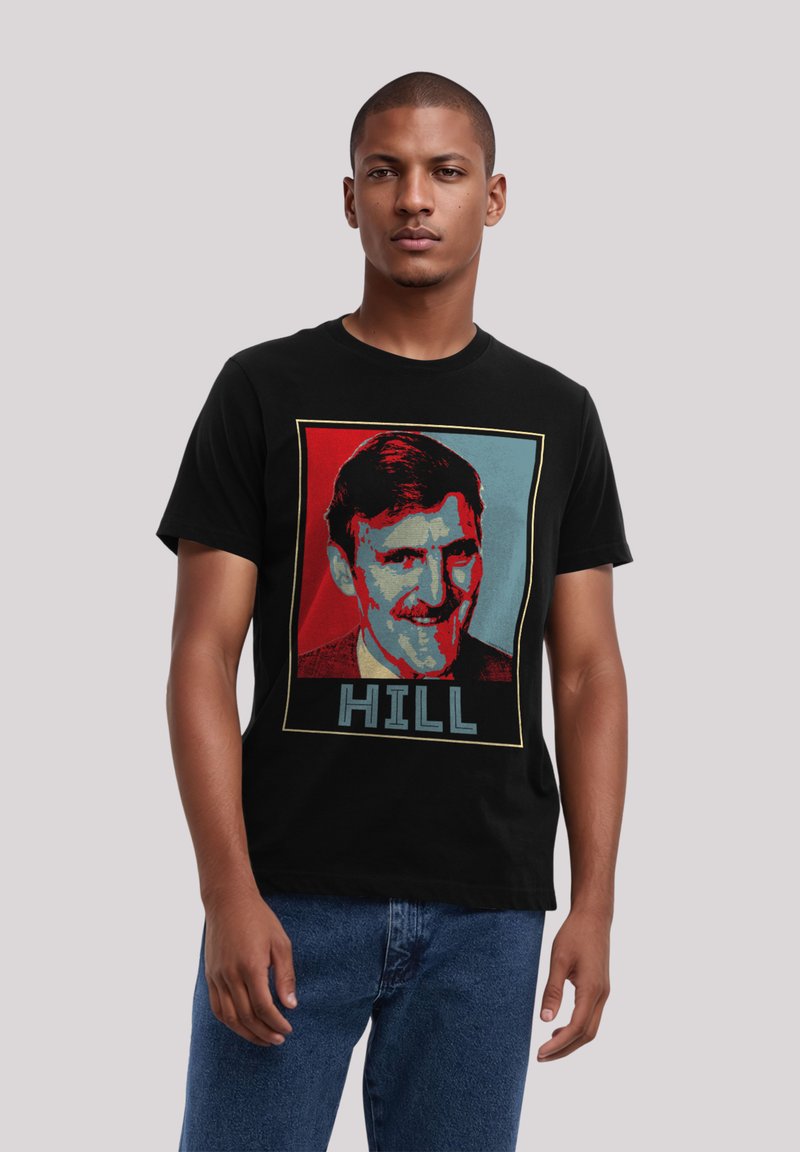 Black T-shirt featuring a colorful graphic print of a man's portrait with the word "HILL" in blue at the bottom, set against a contrasting background.