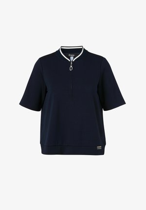 Navy short-sleeve shirt with quarter zipper and ribbed collar featuring white stripe detail, relaxed fit, and small metal brand tag at hem.