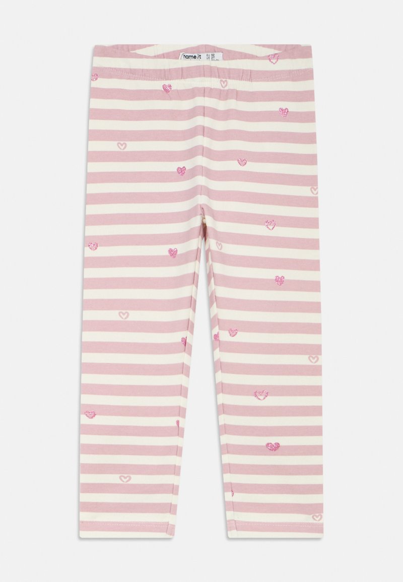 Leggings rayés rose et blanc avec de petits cœurs brodés en rose. Confectionnés en tissu doux et extensible avec une taille élastique.