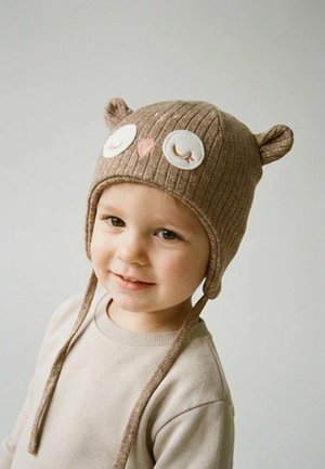 Sterntaler, INKAMÜTZE MIT GLITZER, EULENGESICHT, ANGESCHNITTENEN OHRENKLAPPEN UND BI - Beanie - braun