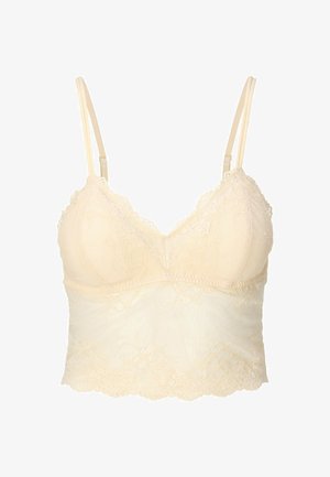 Bralette en dentelle de couleur beige clair, avec des bretelles ajustables, des accents en dentelle florale délicate et une couche inférieure lisse pour le confort.