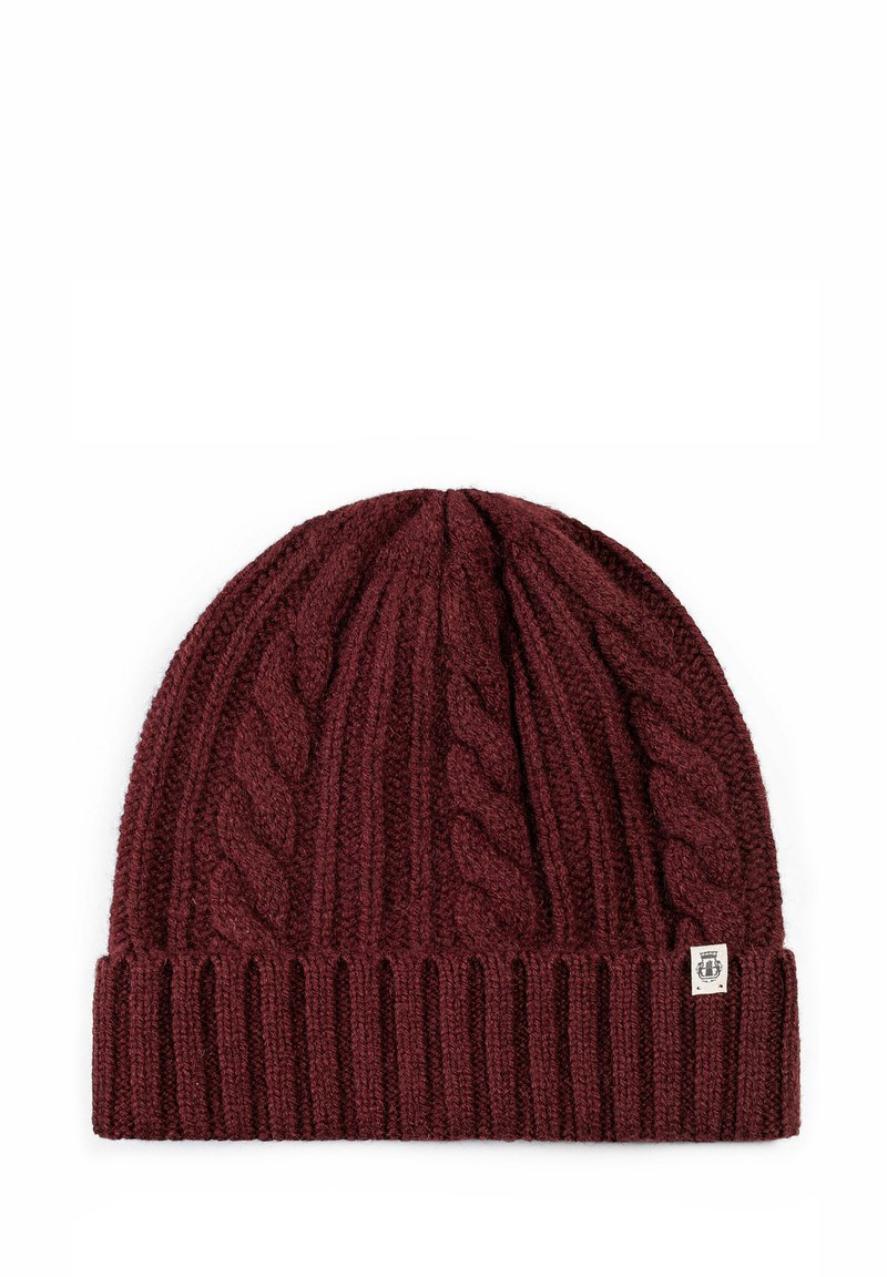 Maroon knitted beanie with textured cable knit pattern and ribbed hem. Features a small logo tag on the side. Soft acrylic material.
