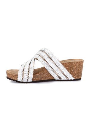 Sandalo zeppa bianco intrecciato slip-on con suola platform in sughero e punta aperta.