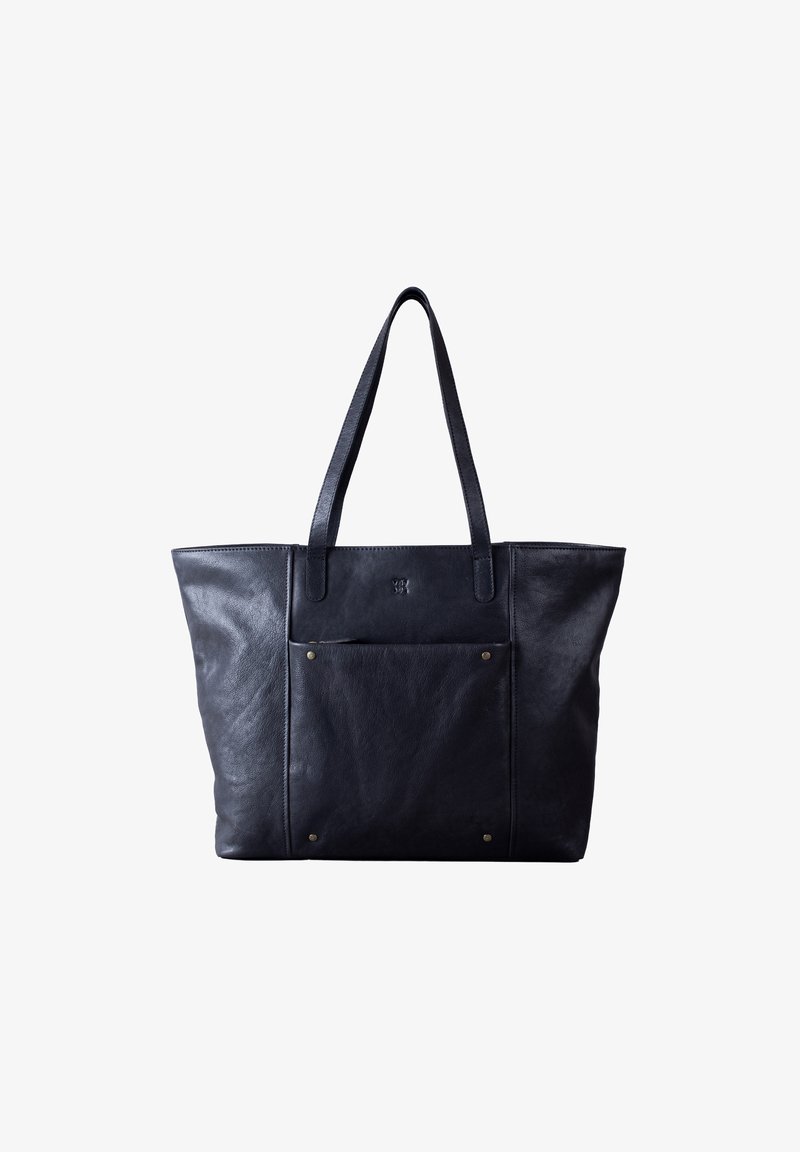 Black leather tote bag with two long handles, a front pocket, and brass hardware accents. Features a smooth texture and minimalist design.