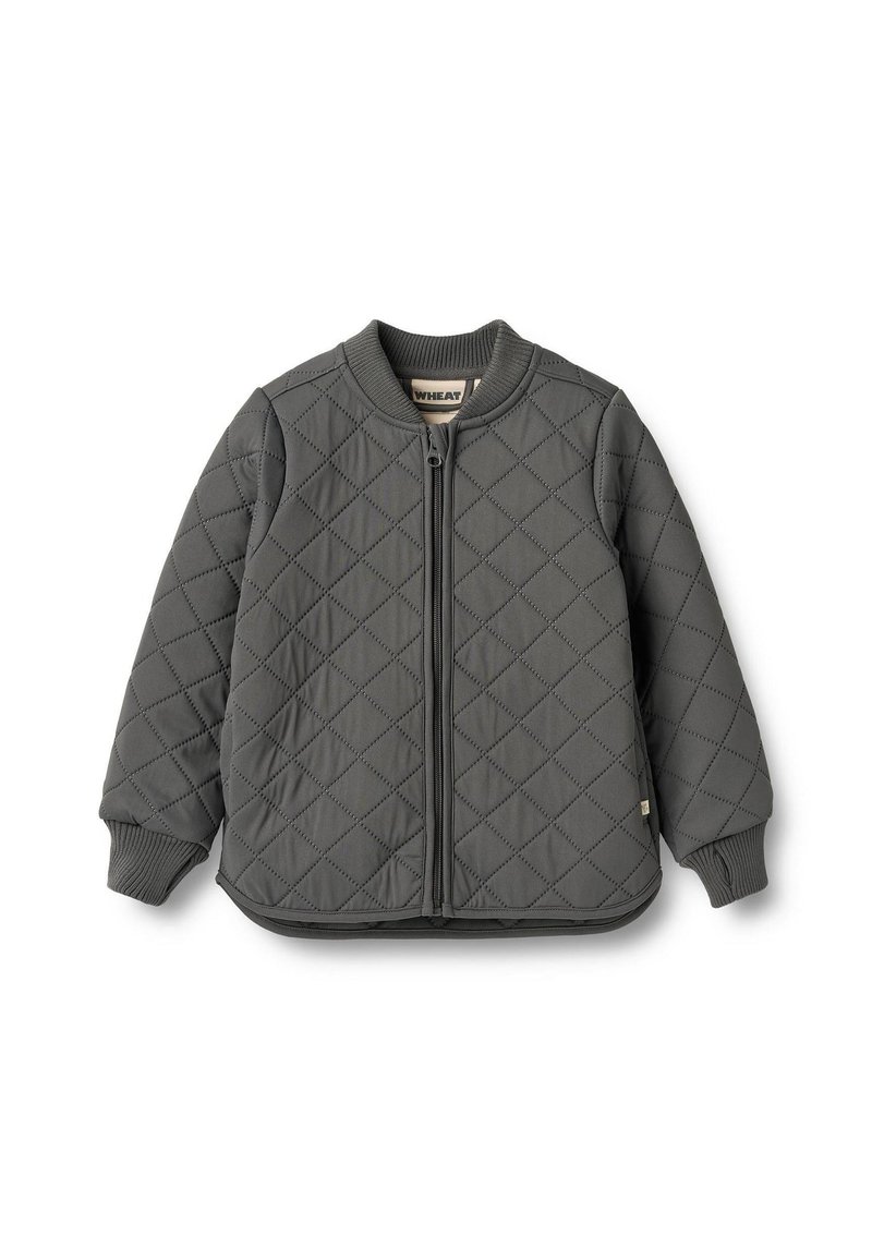 Tikkitakki harmaana, jossa on etuvetoketju, resorikaulus ja -hihansuut, pyöristetty helma sekä pieni merkkilappu alareunassa.