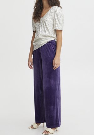 Spodnie materiałowe