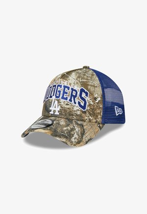 Czapka z przodem w kamuflażu, niebieską siateczką z tyłu, napisem „Los Angeles Dodgers” w kolorze niebiesko-białym oraz białym logo „LA” na przednim panelu.