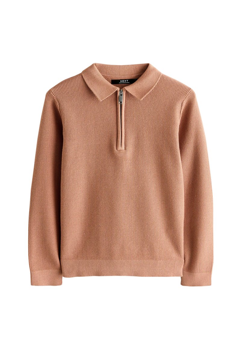 Světle růžový pletený svetr s límcem na zip. Vyrobeno z texturované látky, s dlouhými rukávy a volným střihem.
