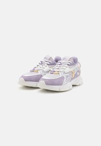 Purple and white athletic sneakers featuring mesh and suede textures, with a cushioned sole and contrasting accents. Lace-up design.