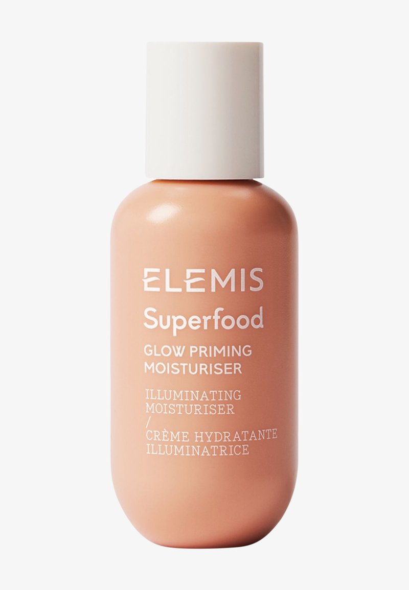 Flacon d’Elemis Superfood Glow Priming Moisturiser avec bouchon beige et corps couleur pêche, étiqueté comme une crème hydratante illuminatrice.