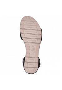 Semelle d'une sandale en taille 37 avec un profil beige, des rainures horizontales et une marque "s.Oliver" sur la zone de l'arche.