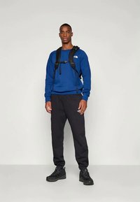 The North Face SIMPLE DOME REGULAR TAPERED JOGGER - Donji dijelovi trenirke - black