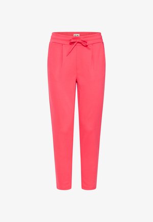 Korálovo ružové zúžené tepláky s elastickým pásom a prednou šnúrkou, vybavené bočnými vreckami a jemnými záhybmi pri páse.