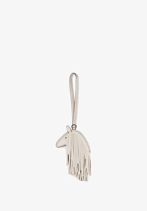 Porte-clés tête de cheval en cuir beige avec crinière à franges et une lanière en boucle pour tenir ou accrocher.