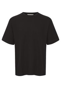 Sort kortærmet t-shirt lavet af ribbet stof, med rund halsudskæring og en afslappet pasform, samt synlige sømadder.