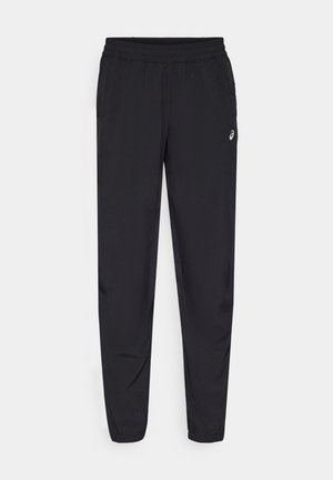 Černé sportovní kalhoty s elastickým pasem, tapered nohavicemi se manžetami, vyrobené z lehkého hladkého materiálu a s malým logem na stehně.