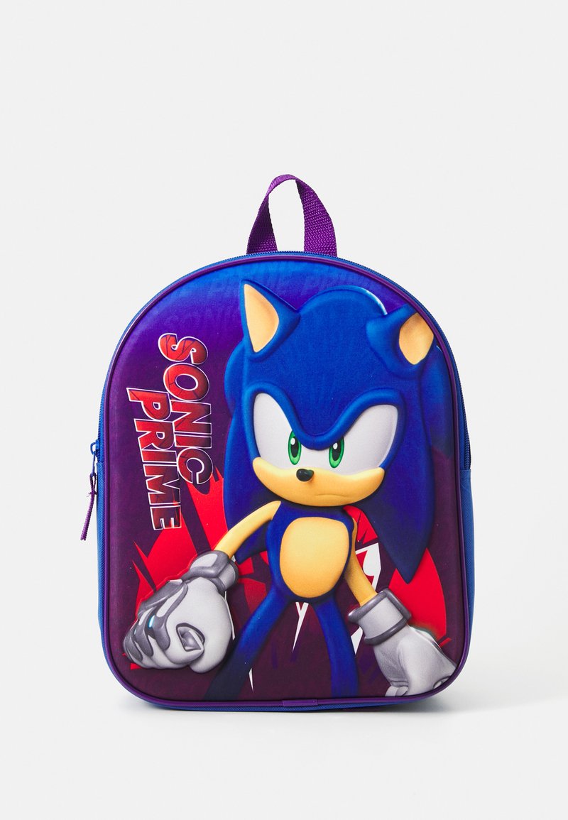 Apvalus kuprinė su mėlynu Sonic personažo dizainu ant violetinio ir raudono fono. Violetiniai dirželiai ir užtrauktuko akcentai.
