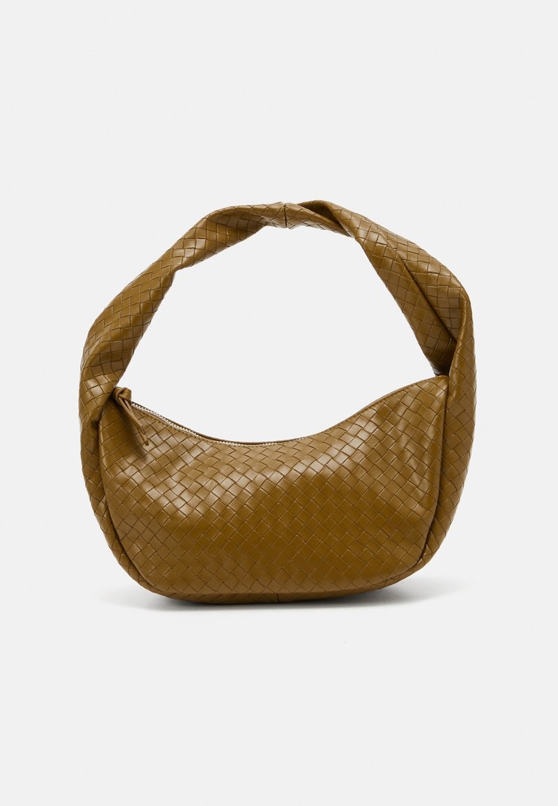 Woven leather handbag in mustard yellow with a rounded silhouette. Features a thick, twisted strap and a zip closure. Textured surface.