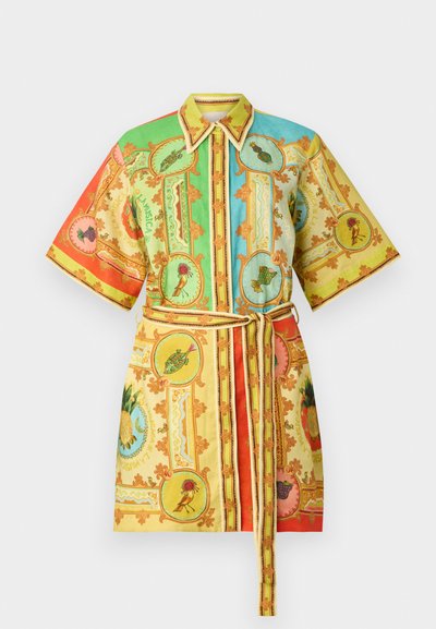 Short-sleeve shirt dress in vibrant yellow, green, and red, featuring ornate floral and animal patterns, with a matching belt and collared neck.