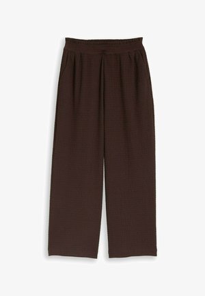 Pantalon large marron texturé avec taille élastique et poches latérales, conçu pour un usage décontracté.