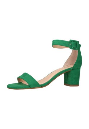 Grøn ruskind blokhæl sandal med ankelrem og spænde, åben tå og beige indvendig foring.