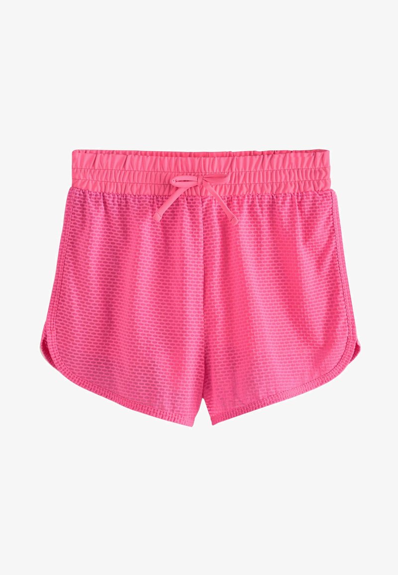 Roze sportbroekjes met een gestructureerd wafelpatroon, een elastische tailleband en een verstelbare trekkoord. Voorzien van zijsplitten voor extra bewegingsvrijheid.