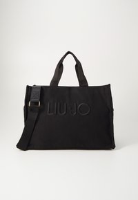 Sac à main en toile noire avec poignées supérieures doubles et bandoulière réglable. Présente un logo "LIU•JO" gaufré et une texture lisse.