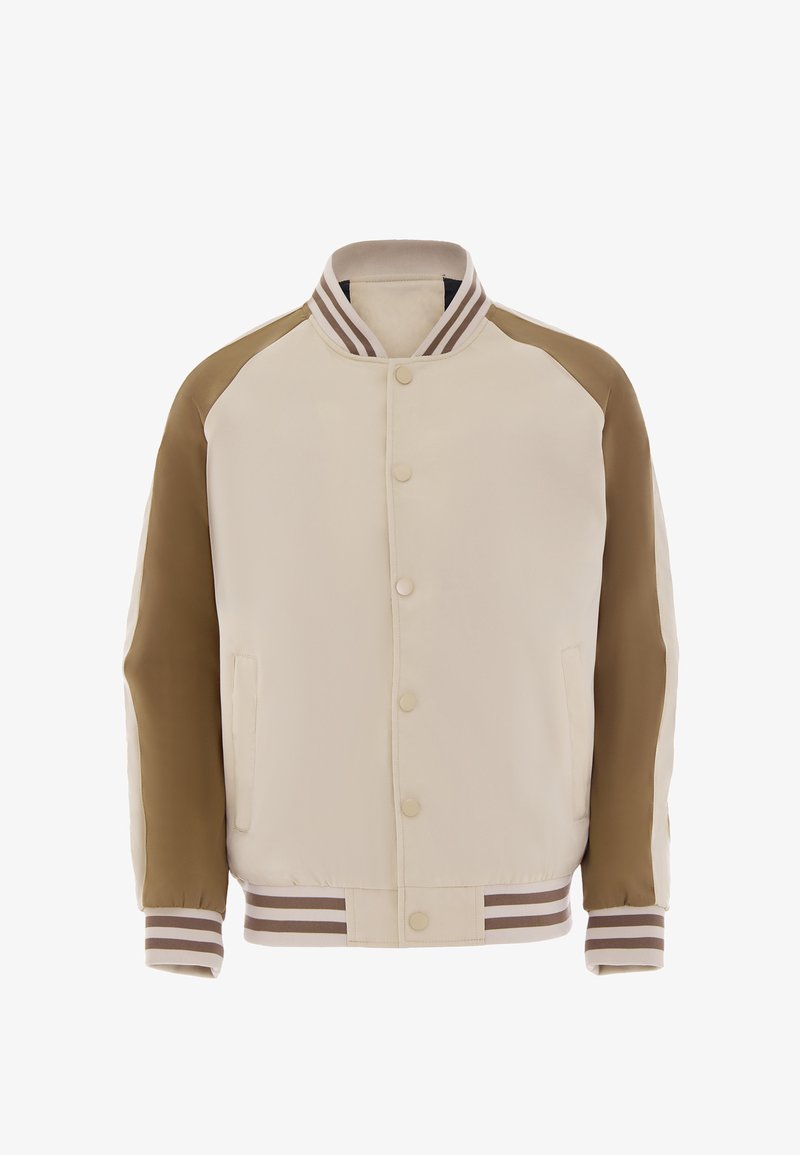 Cream and brown varsity jacket with raglan sleeves, button closure, and striped cuffs. Features a smooth texture and side pockets.