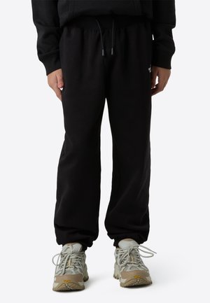 TEEN ESSENTIAL LOOSE UNISEX - Pantaloni de trening - black