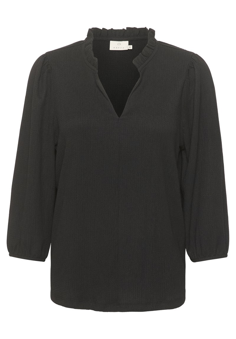Blusa nera con scollatura a V con volant, maniche a tre quarti e tessuto testurizzato. Caratterizzata da spalle leggermente imbottite e vestibilità comoda.